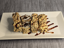 1. Hosomaki w tempurze: Tykwa w tempurze ze słonecznikiem i sosem teriyaki (8 szt.) 